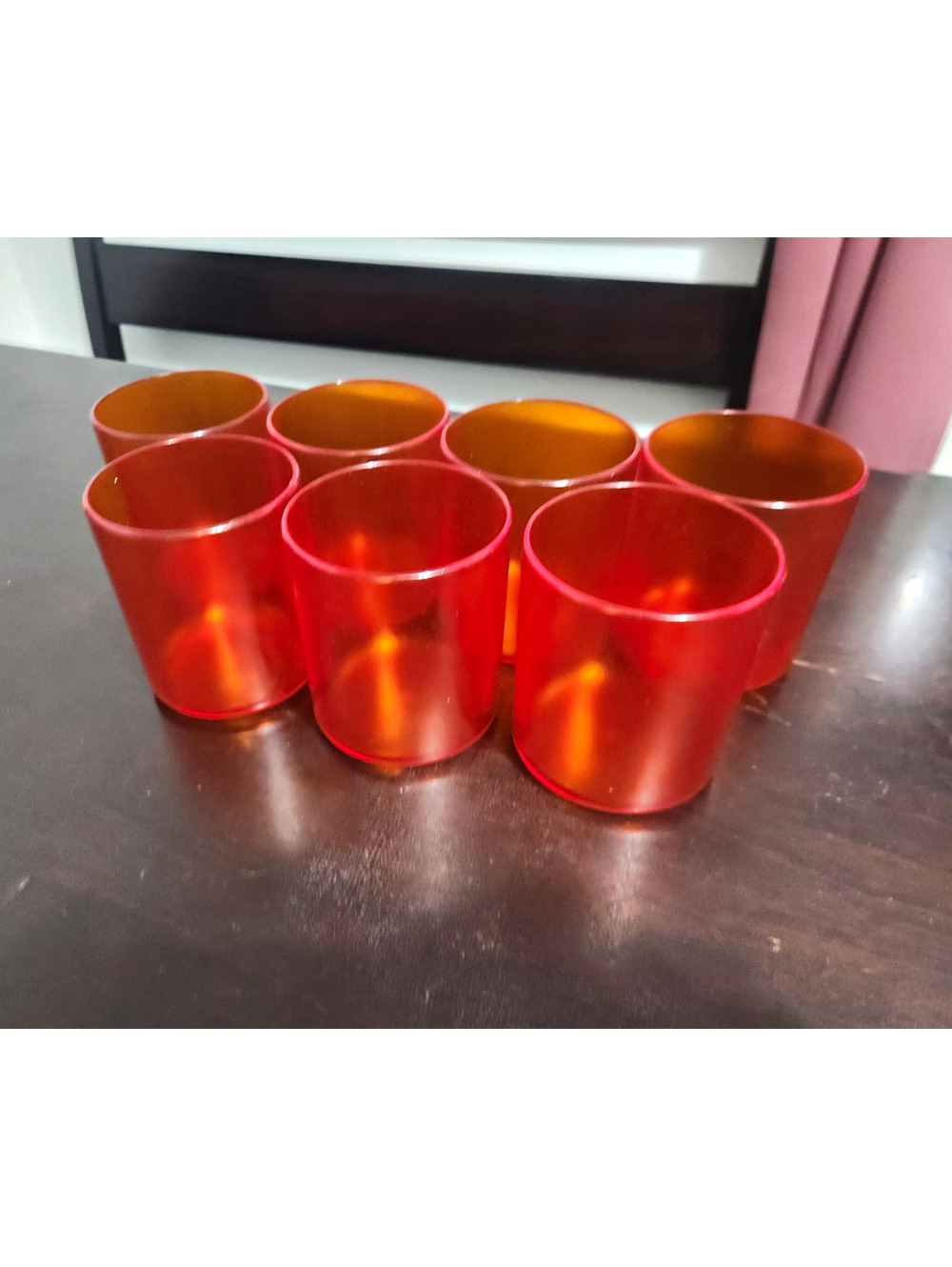 Unmarked Set of 7 Amber Orange/Red Plastic Tumblers 3.5 in Solid Round